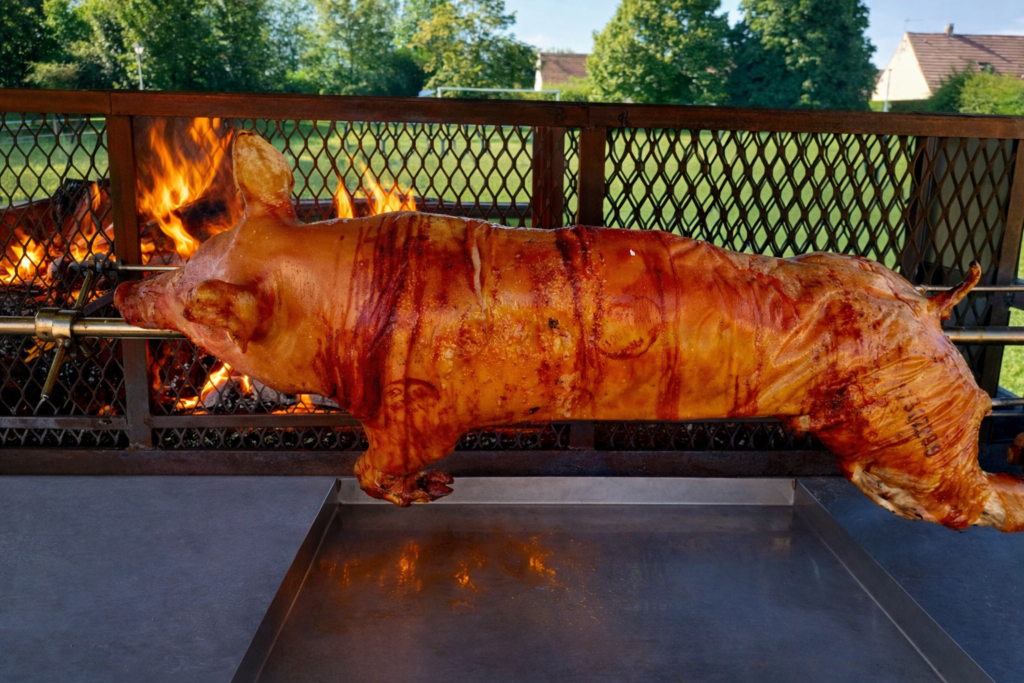 COCHON DE LAIT A LA BROCHE